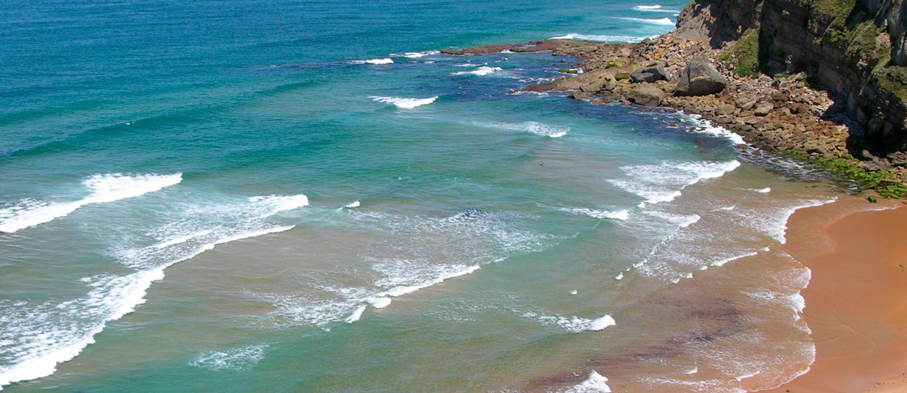 Hacer Surf en la playa de Tablía