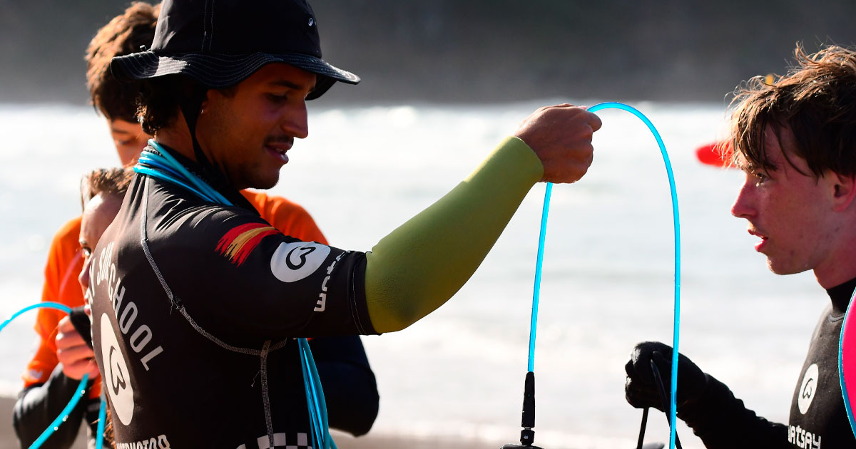 surf lessons teens Spain instructor
